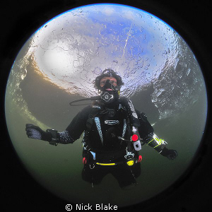 Our world.
A dive under ice at Wraysbury Lake. by Nick Blake 